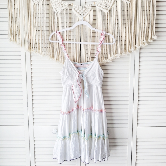 Storia Dresses & Skirts - STORIA White Rainbow Ruffle Knot Front Mini Dress